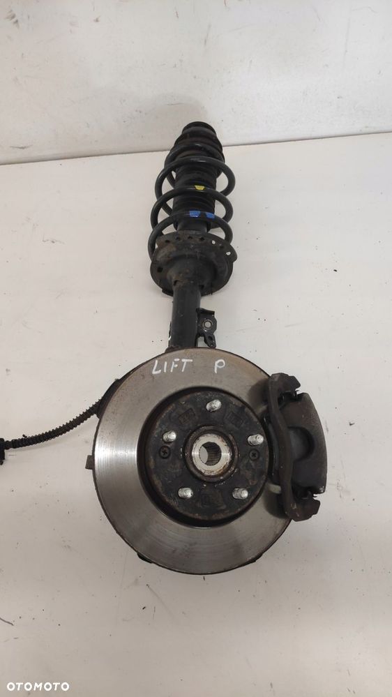 KIA VENGA LIFT MCPHERSON PRAWY ZWROTNICA 15-19 - 1
