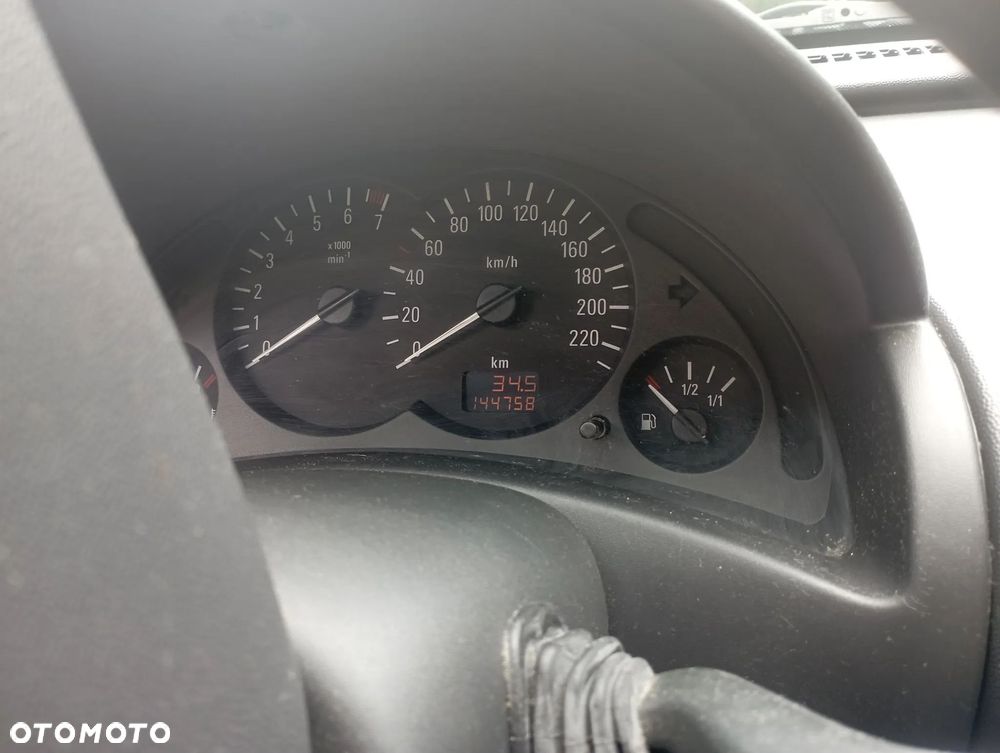 Opel Corsa 1.2 16V Enjoy - 5