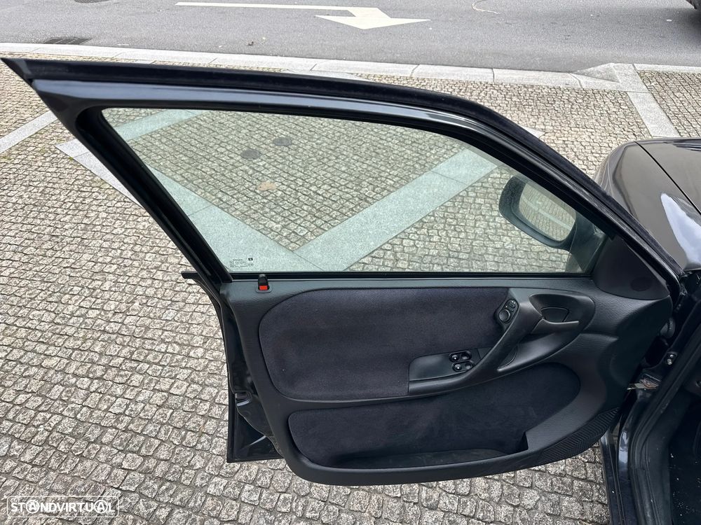 Opel Astra 1.4i 16V Sport - 13