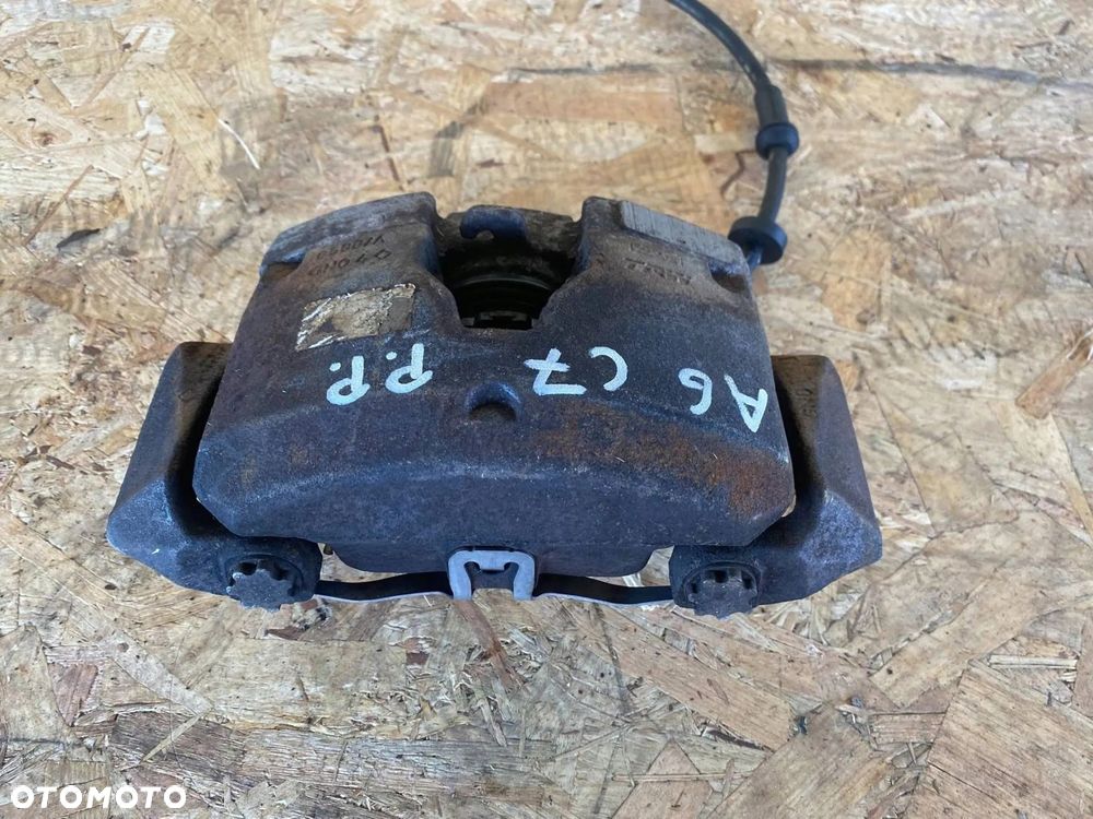 ZACISK HAMULCOWY PRZÓD PRAWY AUDI A6 A7 4G 4G0106AK - 4