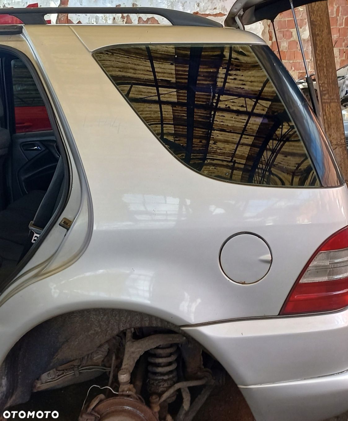 BŁOTNIK TYLNY LEWY MERCEDES-BENZ ML I W163 - 1