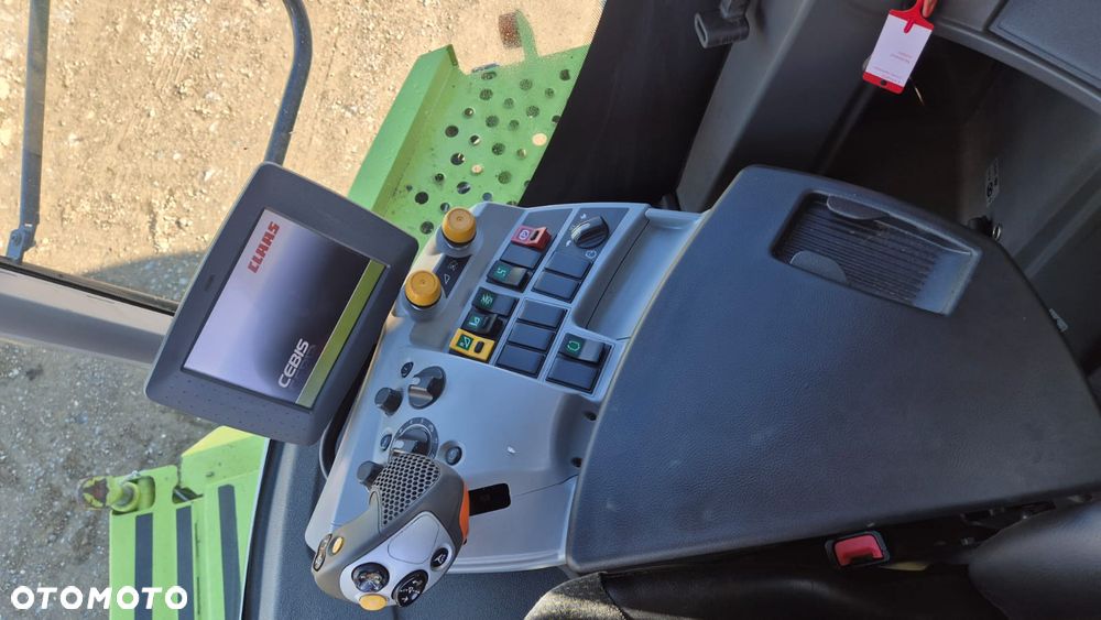 Claas Lexion 780TT z hederem - 9