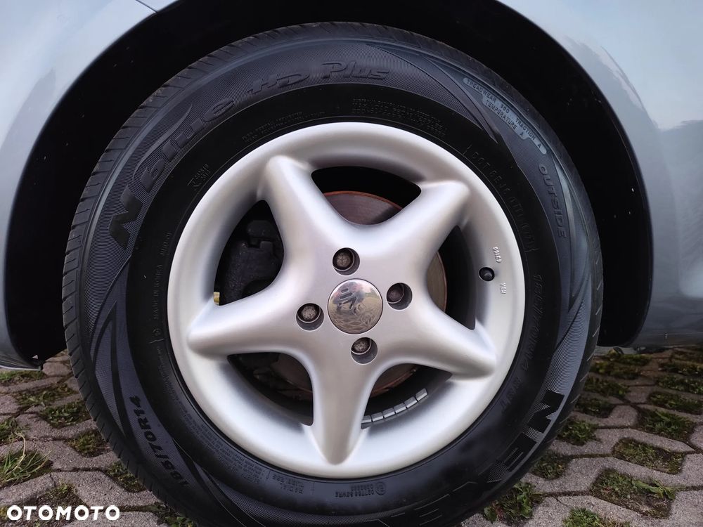 Opel Corsa 1.2 16V Easytronic Cosmo - 19