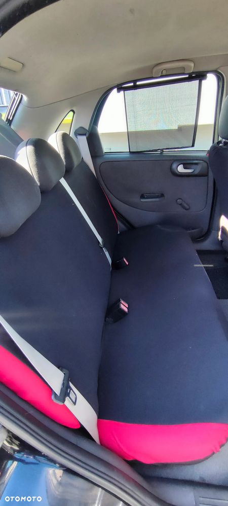 Opel Corsa 1.2 16V Enjoy - 10