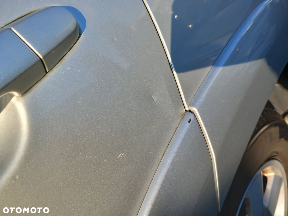 TOYOTA RAV4 III DRZWI LEWE TYLNE LEWY TYŁ KOLOR: 1E7 - 9