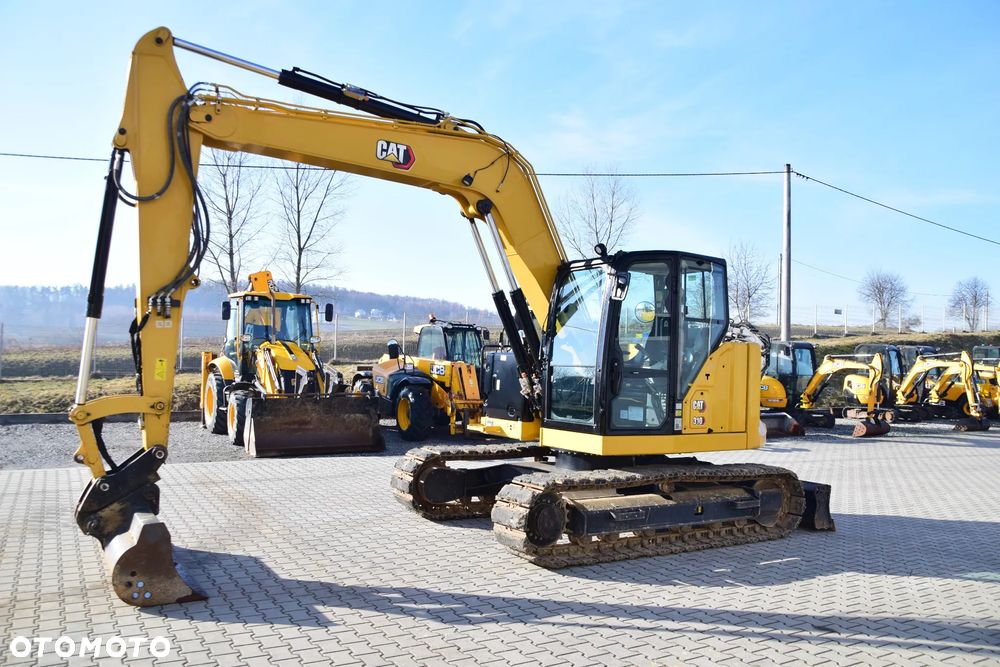 Caterpillar 310 - 2