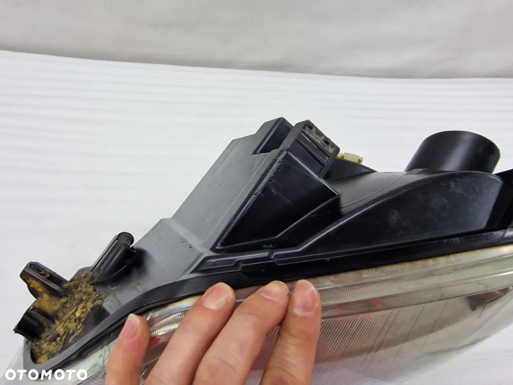 CITROEN BERLINGO I LIFT 02- / PEUGEOT PARTNER LEWA ZWYKŁA LAMPA PRZEDNIA PRZÓD , NR AUKCJI LL474 - 10