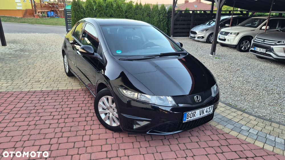 Honda Civic 1.4 i-VTEC Comfort Black Edition - 1