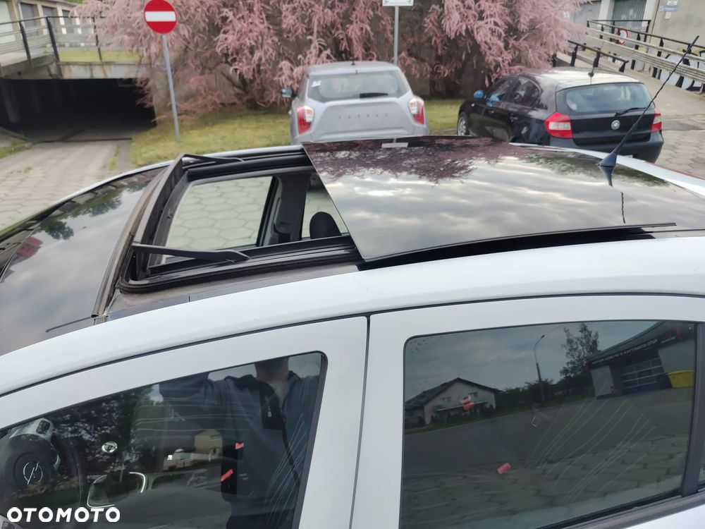 Opel Corsa 1.2 16V Enjoy - 10
