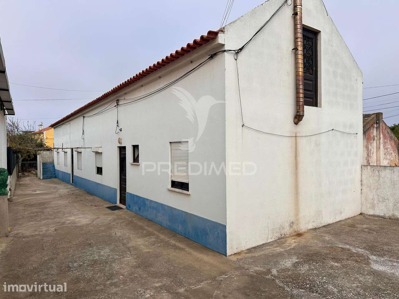 Moradia bifamiliar com dois apartamentos independentes e terreno de... - Grande imagem: 5/35