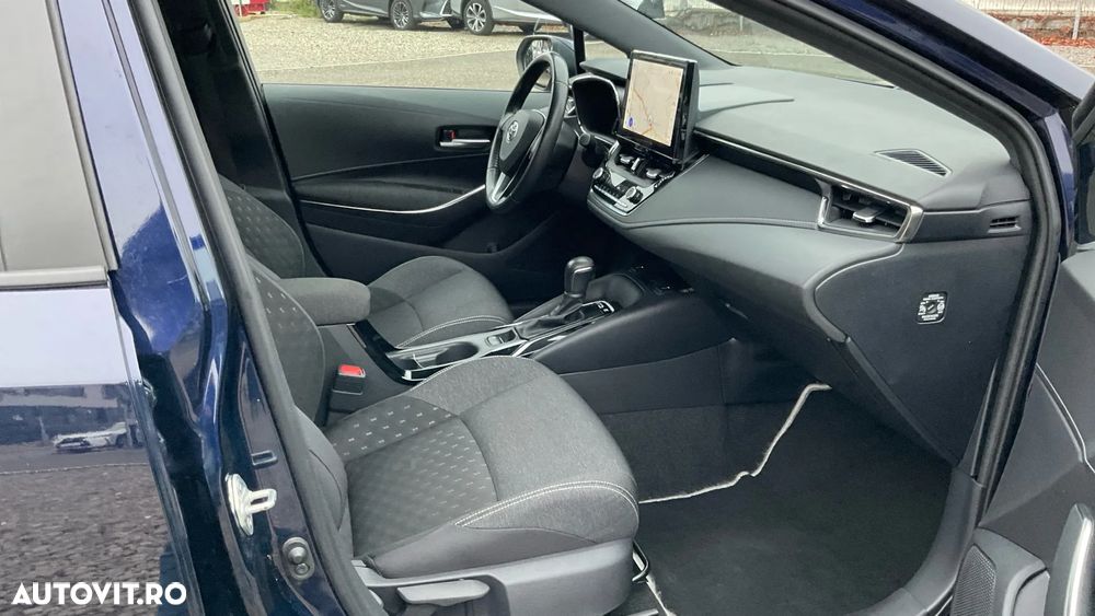 Toyota Corolla TS 1.8 HSD Dynamic - 33