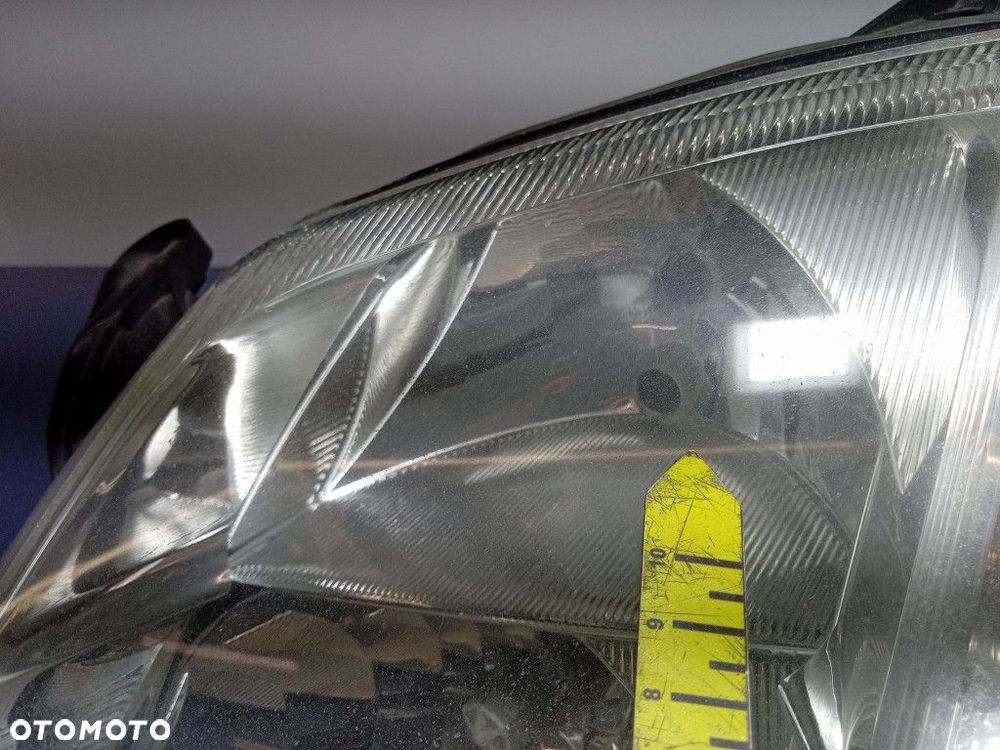 OPEL MERIVA A REFLEKTOR LEWY LAMPA EU 93321052 - 6