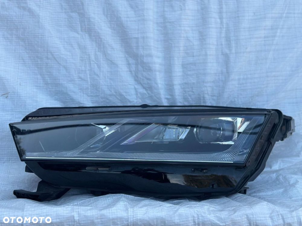 LAMPA LEWA PRZÓD SKODA OCTAVIA 4 IV 5E4941015A - 1