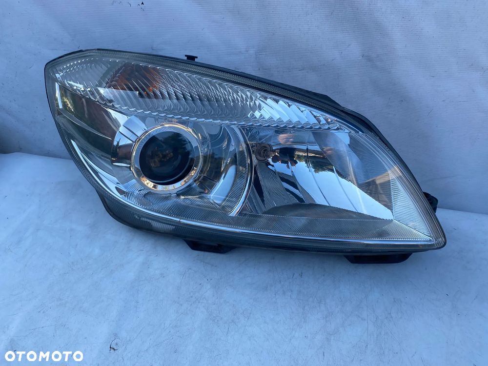 lampa fabia II lift soczewka prawa eu cała - 1