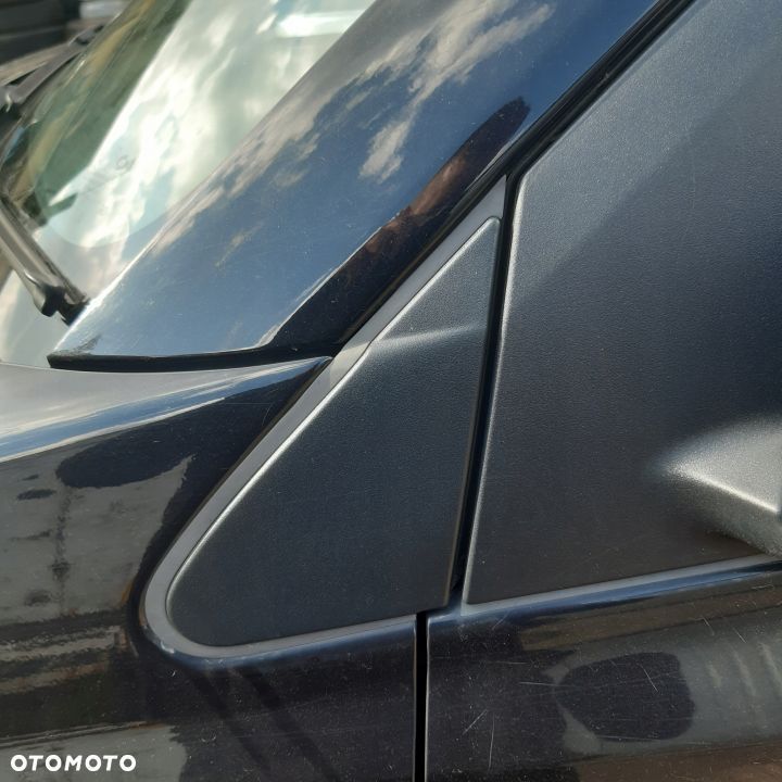 RENAULT KOLEOS trójkąt osłona błotnika lewy - 1