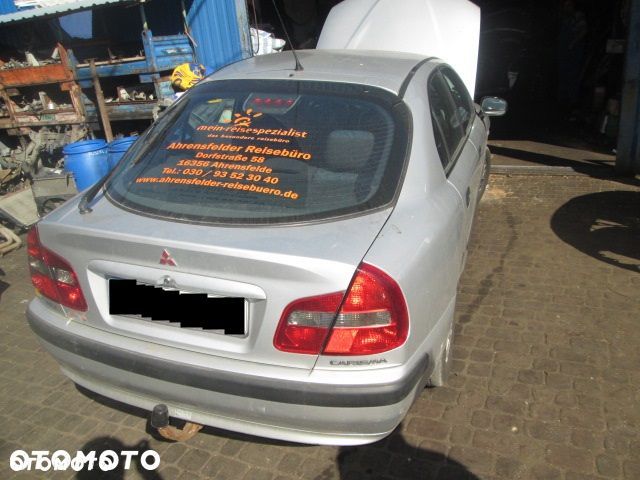 SILNICZEK WYCIERACZEK MITSUBISHI CARISMA 00-04 HB - 1