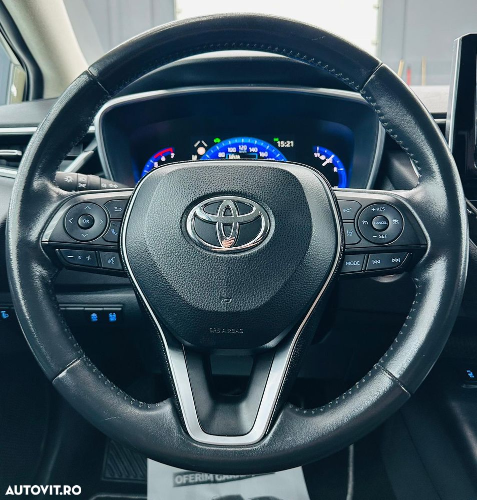 Toyota Corolla 1.8 HSD Exclusive - 33
