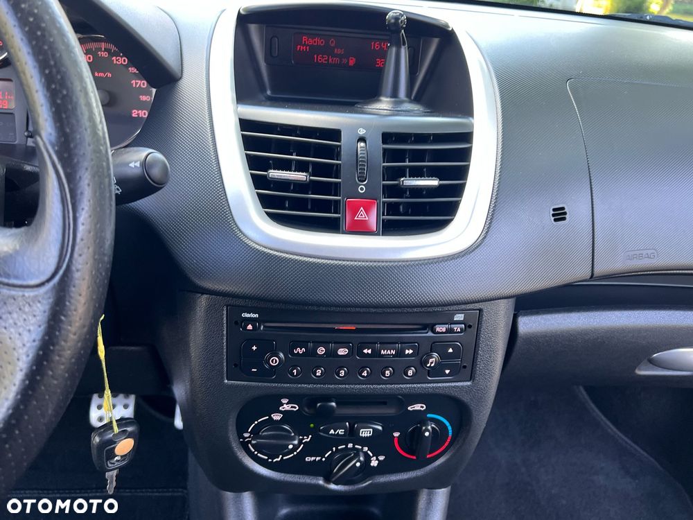 Peugeot 206 plus 75 - 23