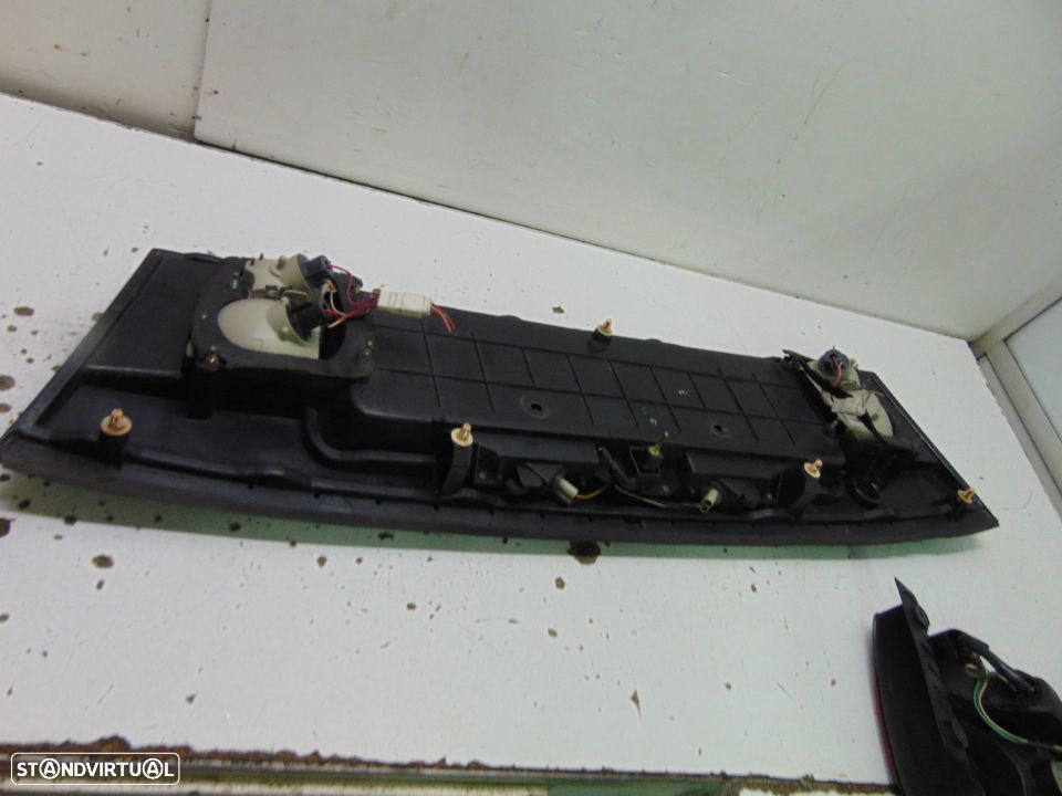 Toyota corolla xli farolins /Placa central - 10