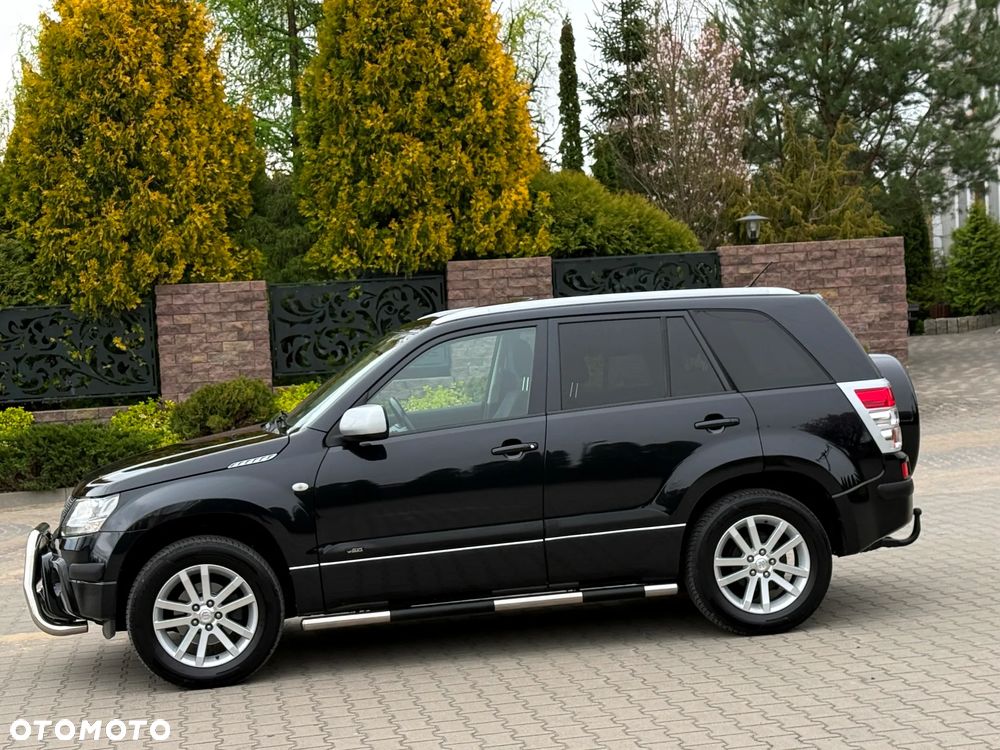 Suzuki Grand Vitara 2.0 Comfort + - 18