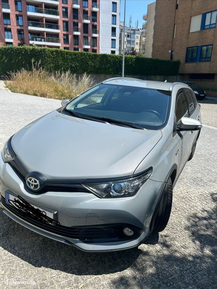 Toyota Auris Touring Sports 1.8 HSD Comfort+P.Sport - 1