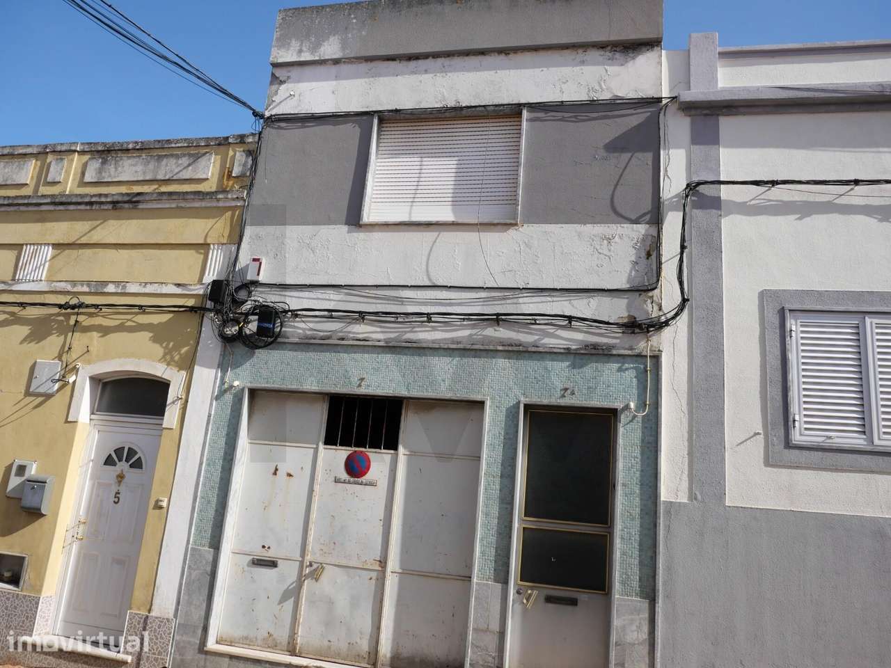 Moradia T1 tradicional com 60m2 e com armazém de 60m2 no centro de Por - Grande imagem: 2/23