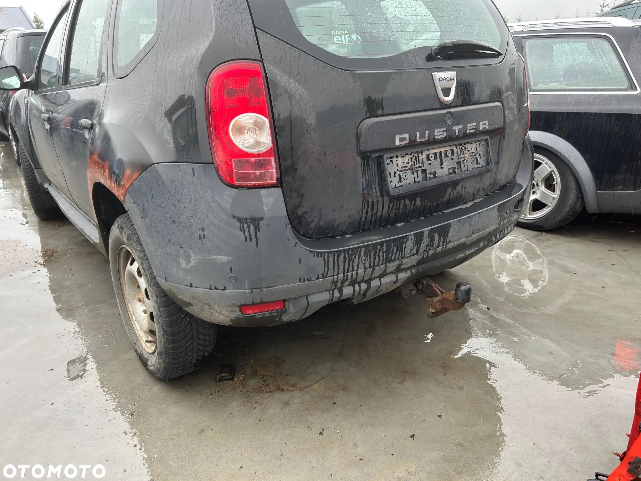DACIA DUSTER 1 ZDERZAK TYŁ PARKTRONIC KOMPLETNY - 1