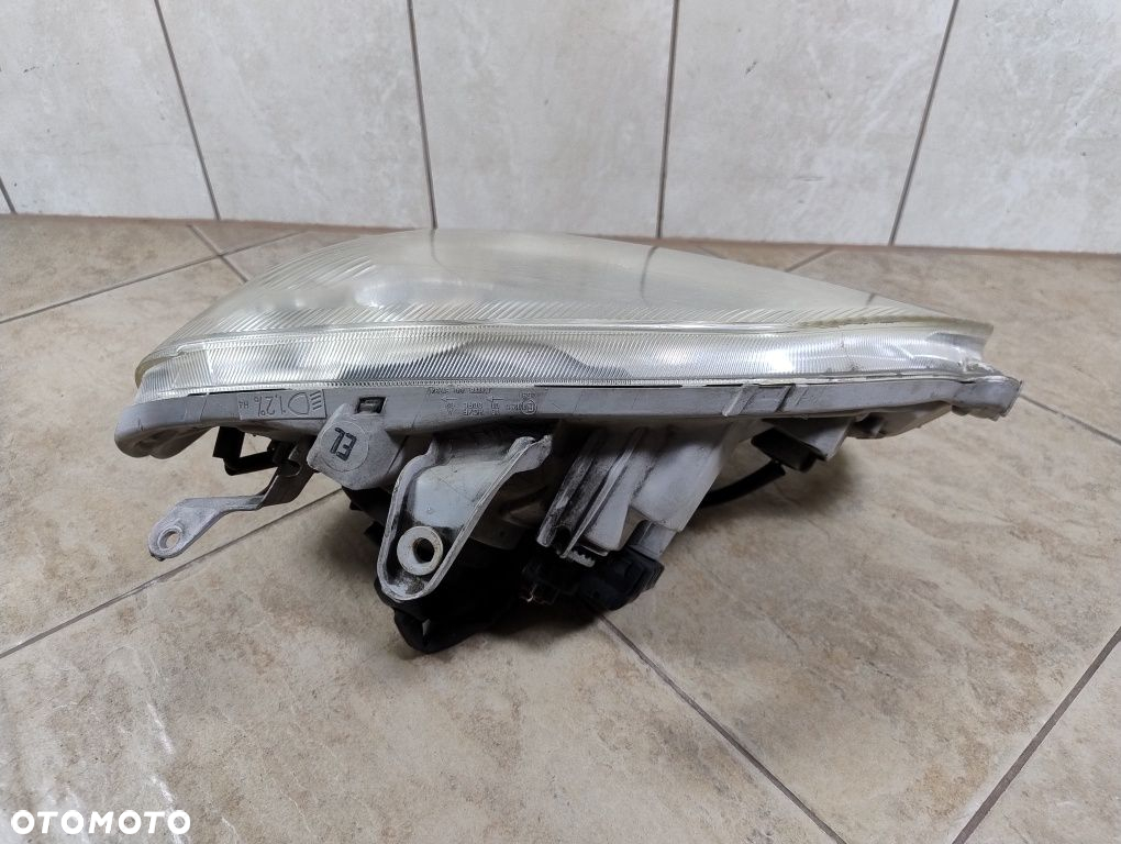 Daihatsu cuore 03-07 lampa lewa przód reflektor Europa wysyłka OLX - 7