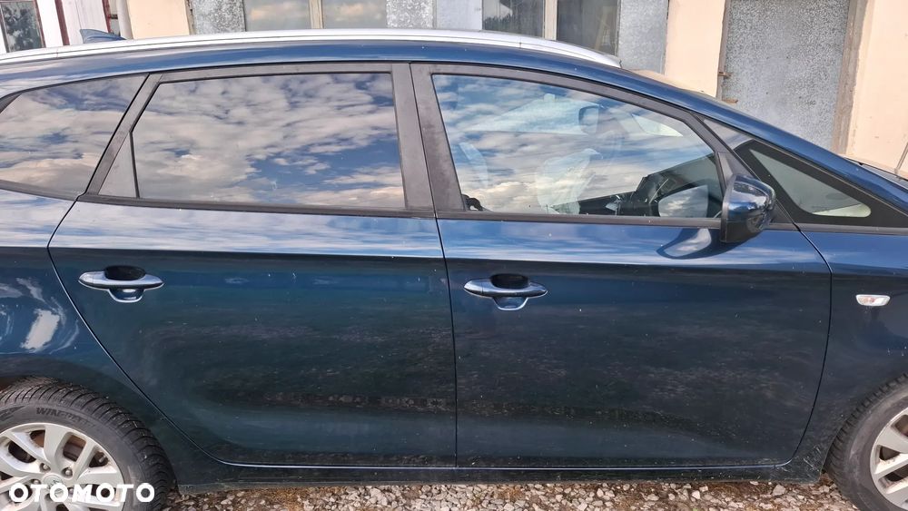 Kia Carens - 3