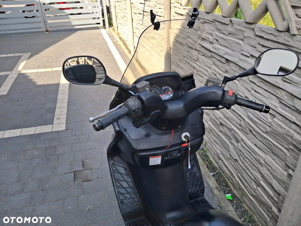 Suzuki Burgman - 9