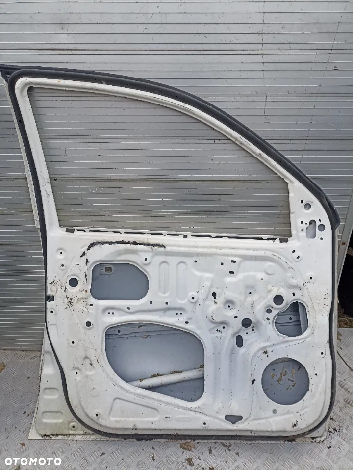 115. TOYOTA HILUX DRZWI LEWE 2005- 4-DRZWIOWY - 4