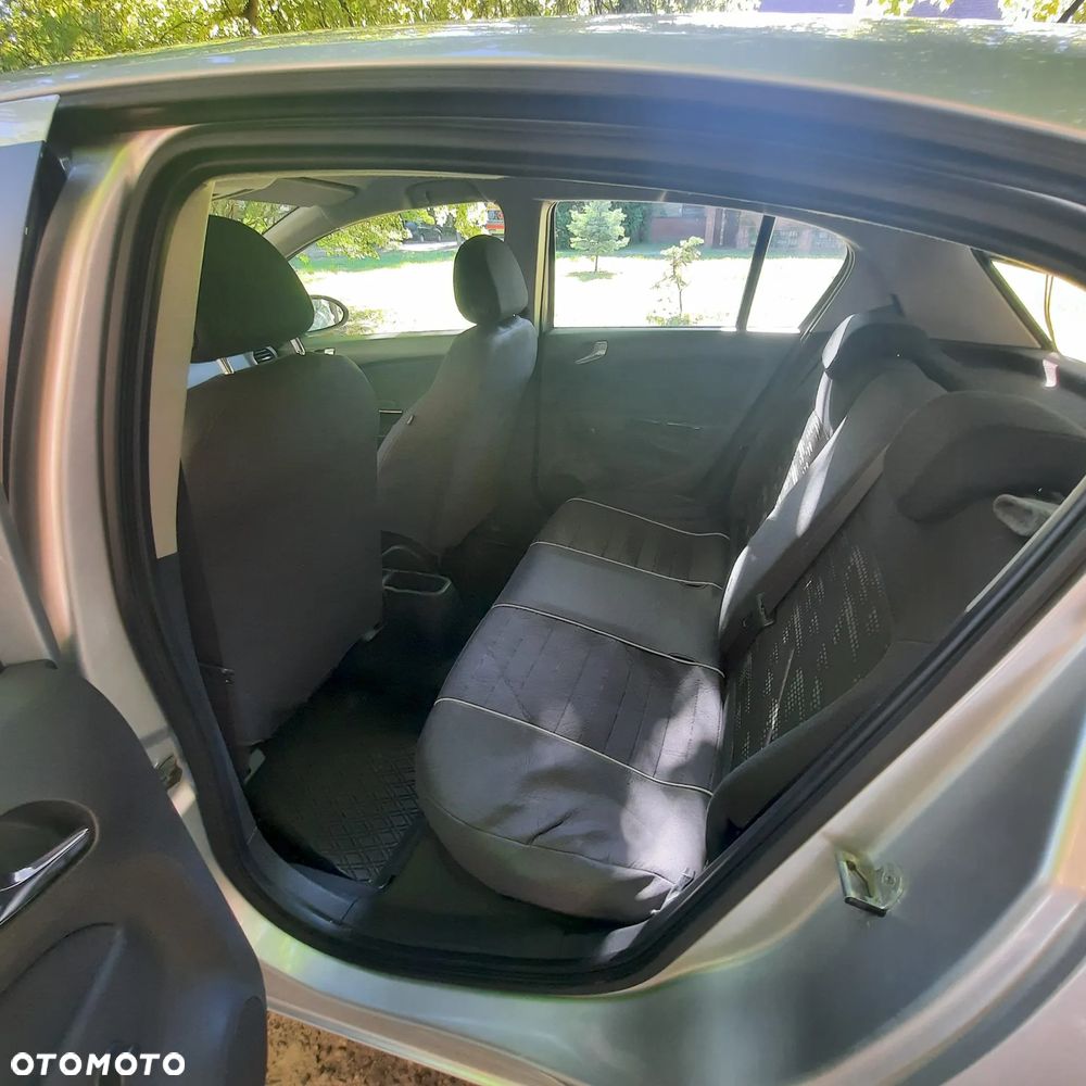 Opel Corsa 1.2 16V Enjoy - 8