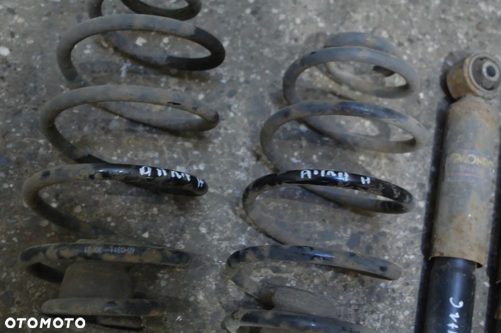 AMORTYZATORY TYŁ TYLNE + SPRĘŻYNY OPEL ASTRA III H 1.6 3D MONROE - 3