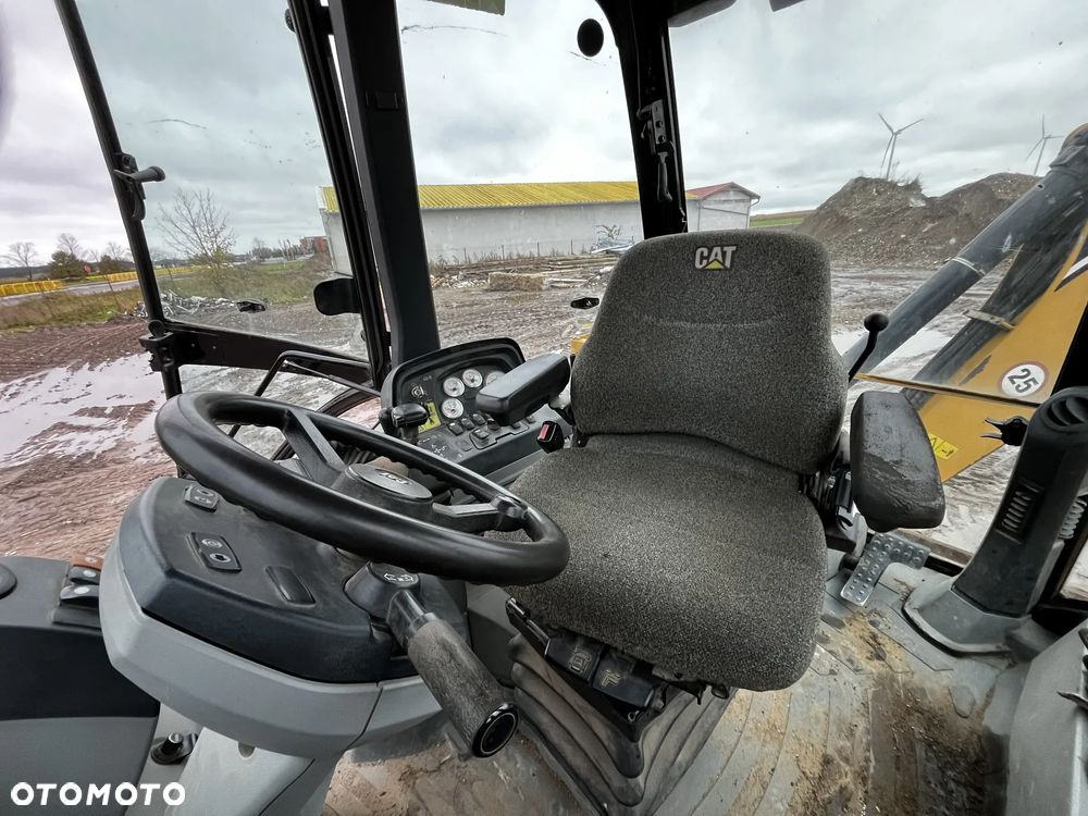 Caterpillar 428E - 7