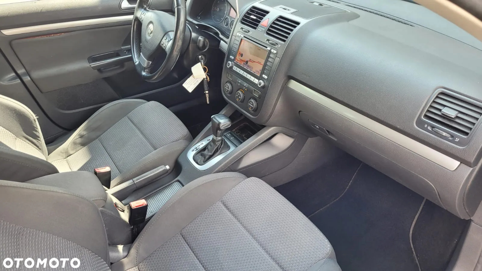 Volkswagen Golf 2.0 TDI DPF BlueMotion Technology DSG Comfortline - 12