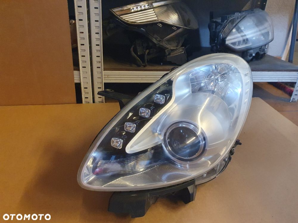 REFLEKTOR LEWY ALFA ROMEO GIULIETTA SOCZEWKA EUROPA