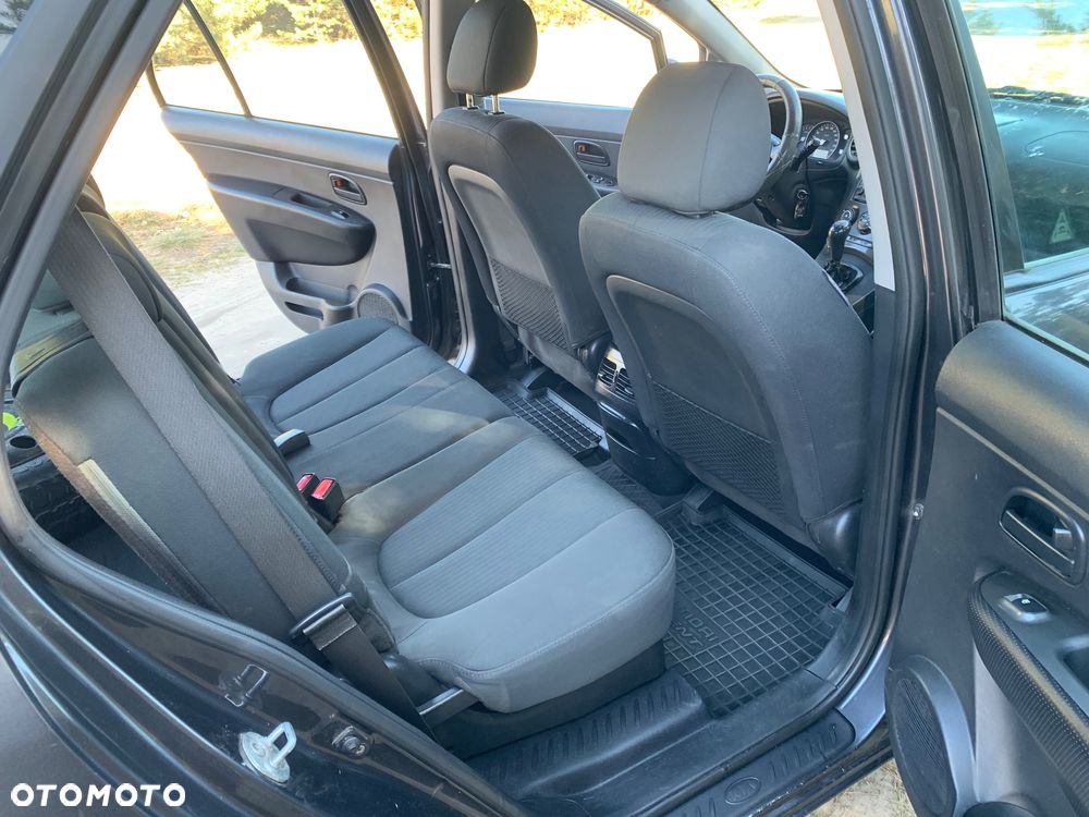 Kia Carens 2.0 CVVT LX - 19