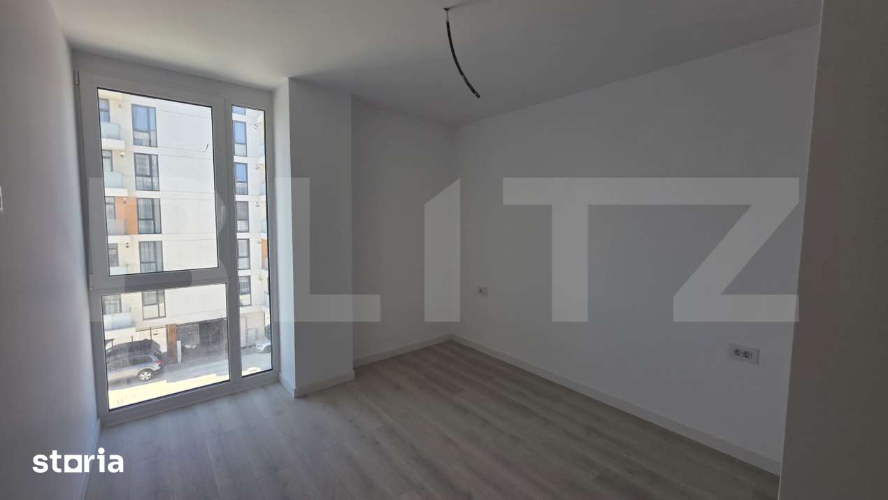 Apartament 2 camere, decomandat, etaj 3, parcare subterana inclusa — fotografia 1