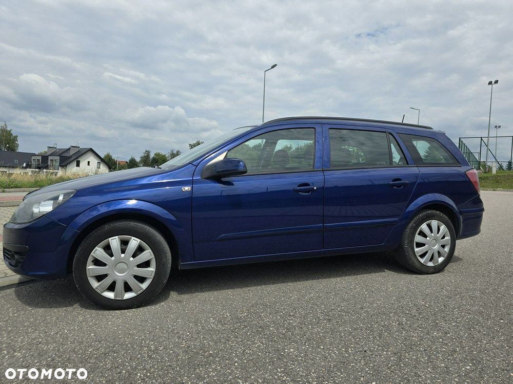 Opel Astra 1.8 Caravan Edition - 7