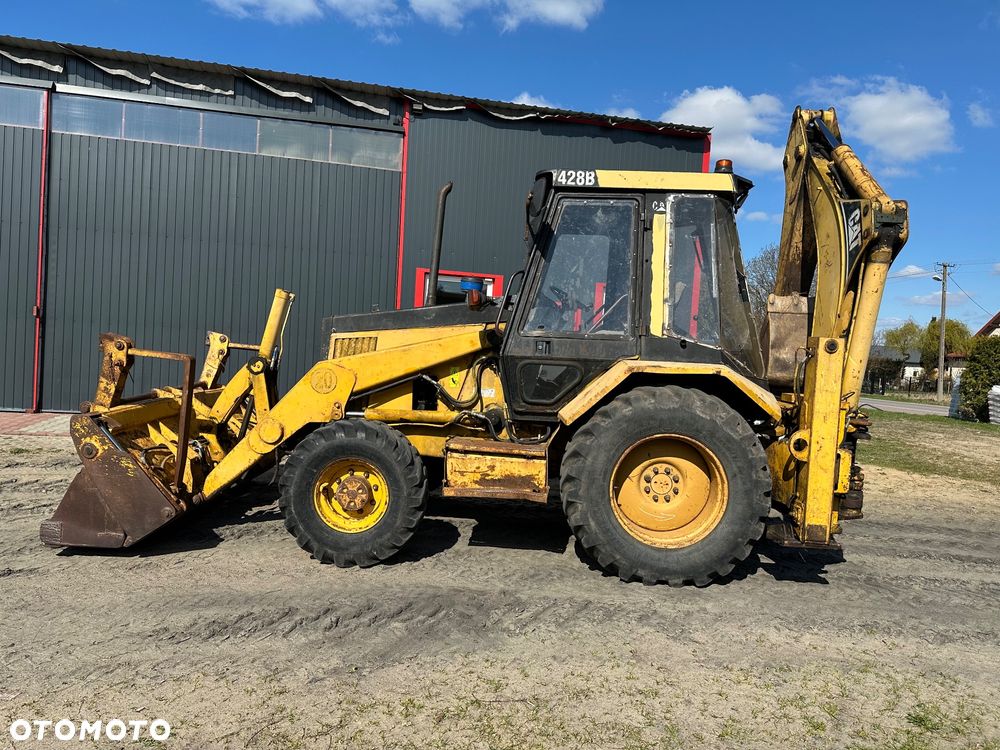 Caterpillar 428B ramię typu Banan - 10