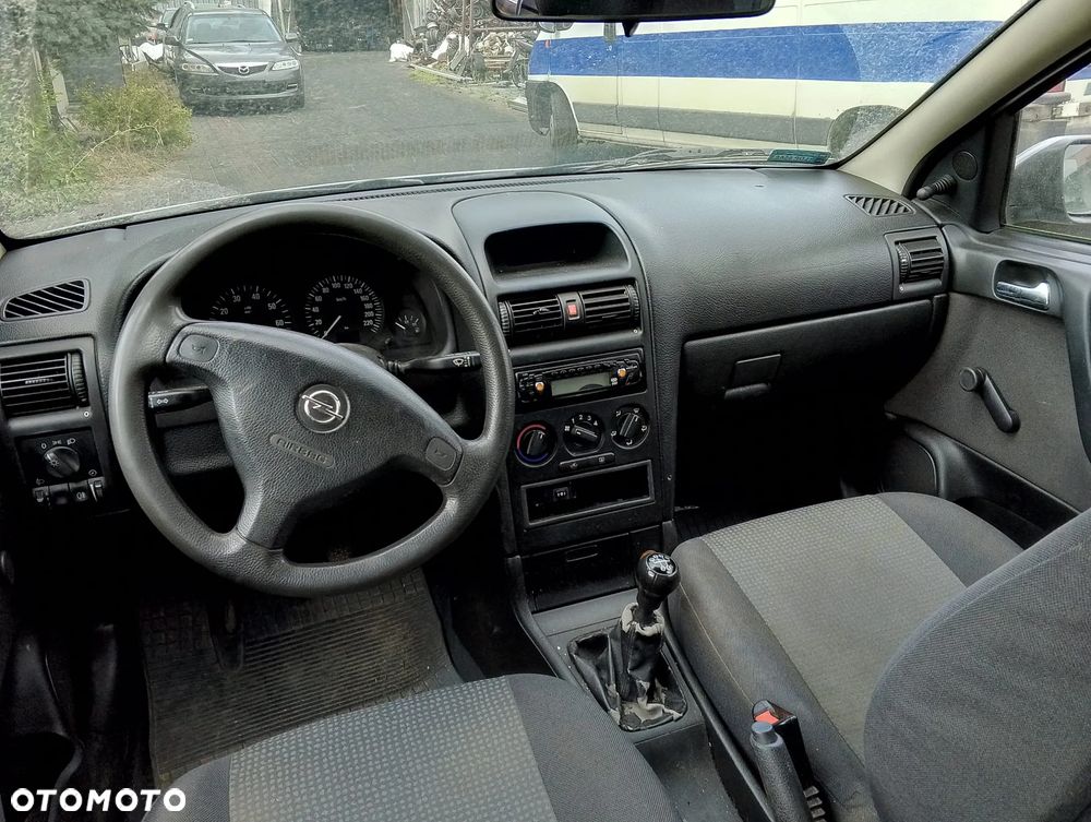 Opel Astra G (04r.) 2.0 HDI 89KM. Silnik Z14XE Skrzynia MG4 lakier 163 / 4AU / GBJ - SILVER LIGHTNING.Cały na części. GWARANCJA !!!  Przód Tył Zestaw Komplet Drzwi Klapa Zderzak Błotnik Maska Grill Atrapa Szyba Pas Lampa Lusterko Boczki Fotel Kanapa Kokpit Deska Rozdzielcza Przełącznik Włącznik Sterownik Przewody Wiązka Instalacja Moduł Komputer Czujnik Listwa Pompa Alternator Wtryski Głowica Rozrusznik Kompresor Sprzęgło Dwumas Silnik Skrzynia ABS Klimatyzacji Paliwa Wspomagania Kolektor Turbina Przepustnica Zawór Chłodnica Koło Hak Belka Sanki Zawieszenie Mcpherson Półoś Amortyzator Wydech Tłumik Zacisk Most - 10
