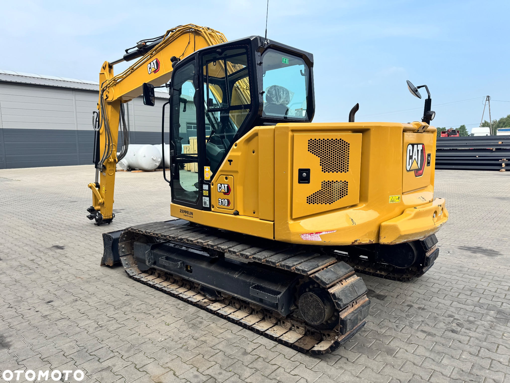 Caterpillar 310 - 4