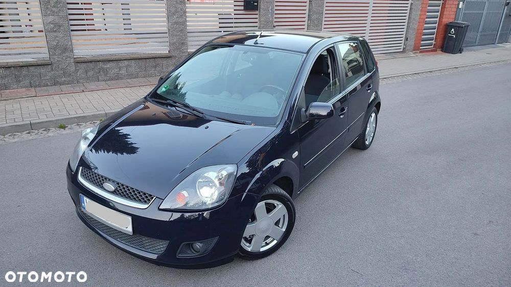 Ford Fiesta 1.4 Ghia - 7