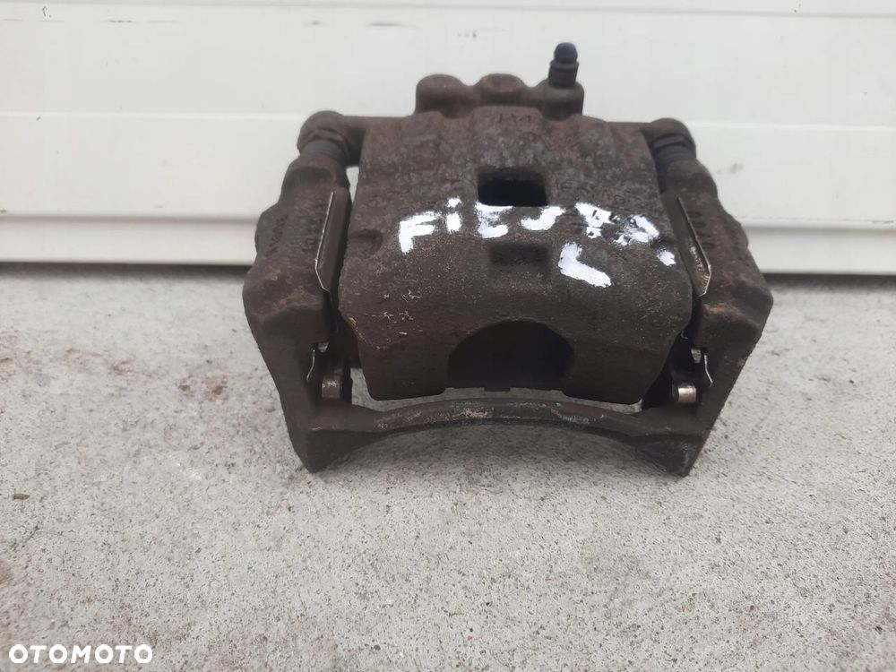 ZACISK LEWY PRZÓD PRZEDNI FIESTA MK7 TDCI - 2