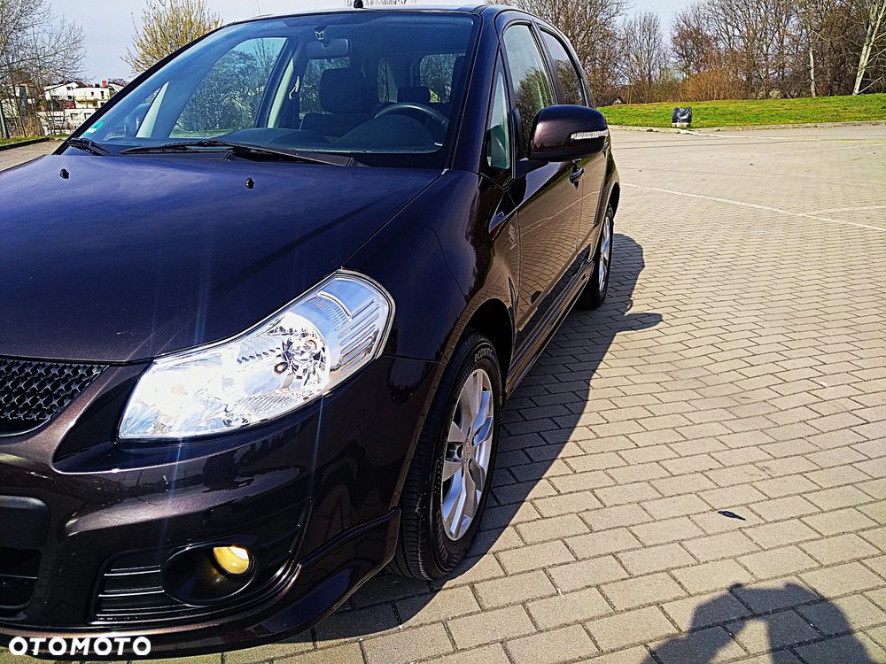 Suzuki SX4 1.6 Comfort Plus - 4