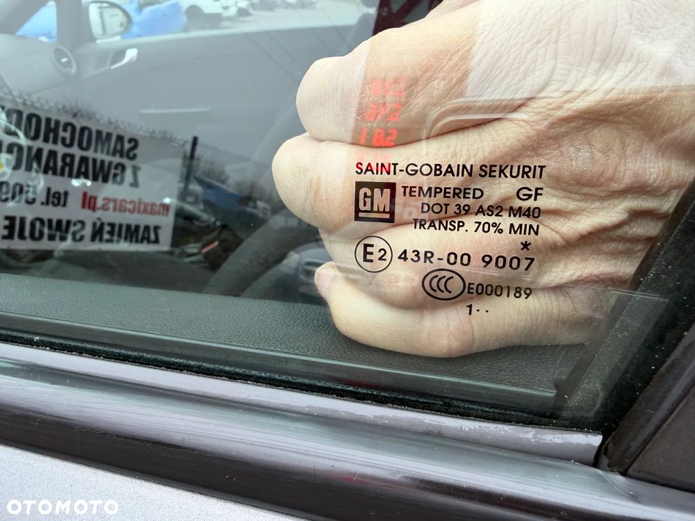 Opel Corsa 1.4 16V Cosmo - 7