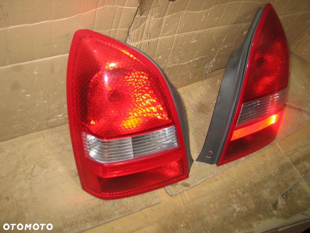 lampa tyl prawa lewa nissan primera P12 sedan oryginal - 4