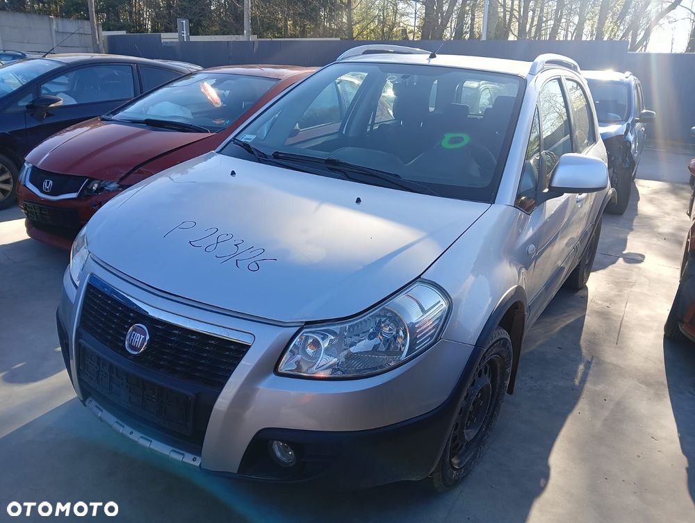 Zderzak Przód (Lampa, Błotnik, Maska, Drzwi, Klapa, Kierownica) Fiat Sedici 1.6 Benzyna 107 Km 2009r - 2