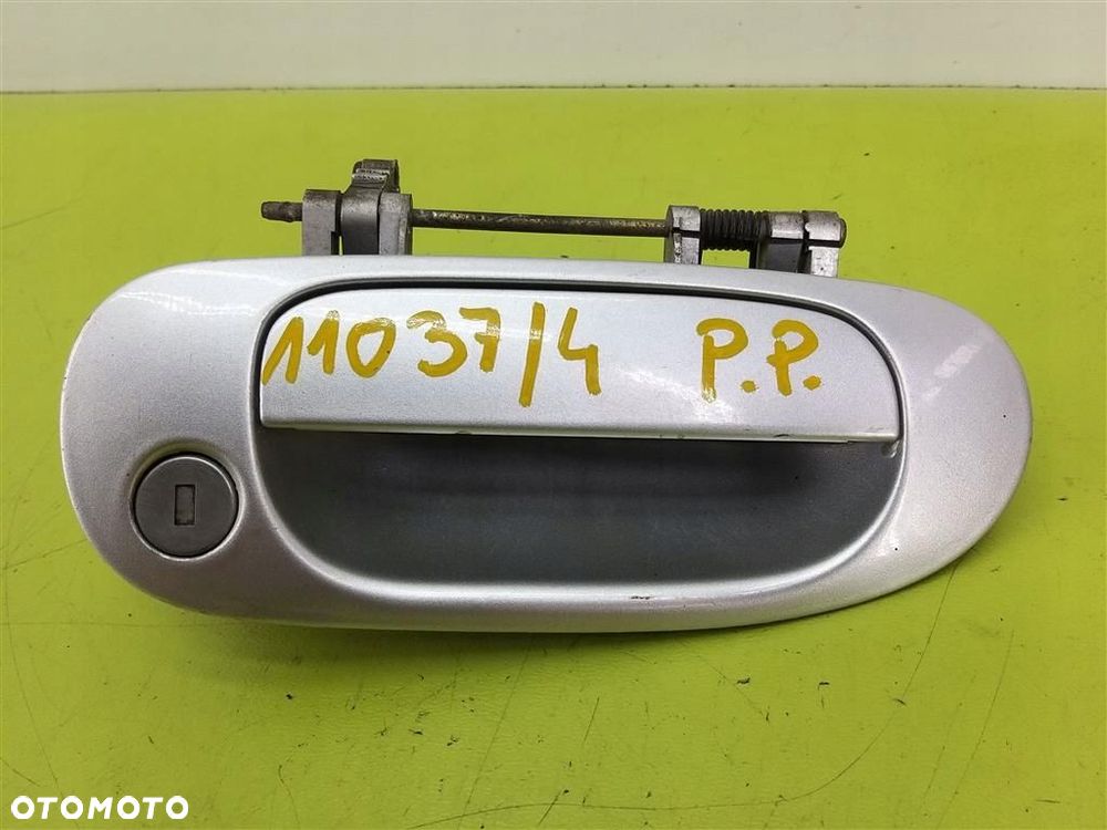 Klamka zewnętrzna przód prawa Mitsubishi Carisma II 99-04 53P Srebrny - 1