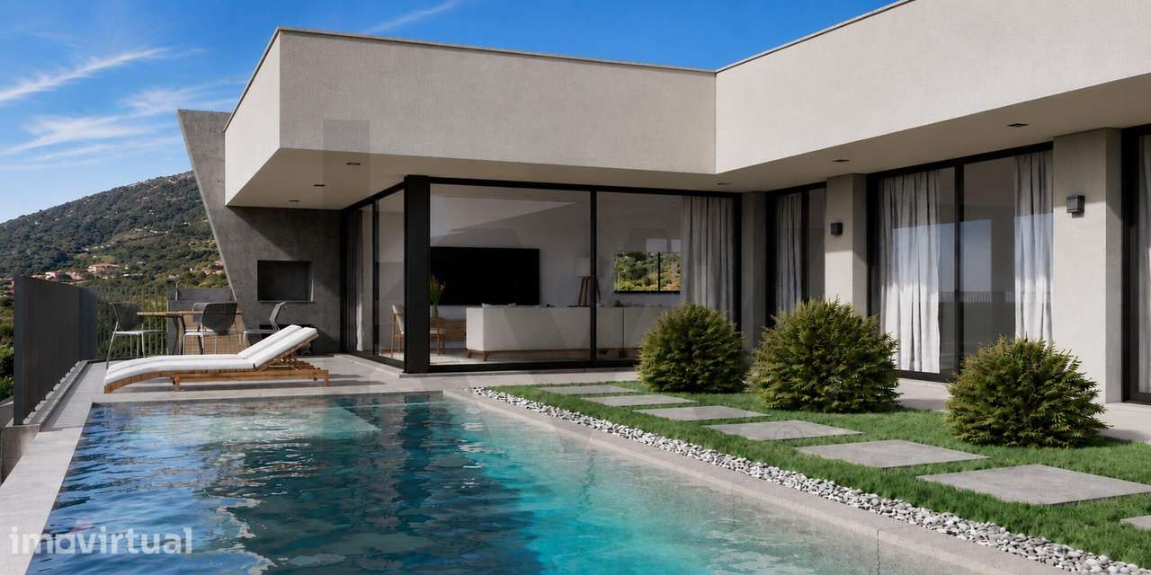 Moradia T3 Térrea de Arquitetura Contemporânea com Piscina Infinita e - Grande imagem: 2/13